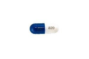 Pill KU 820 Blue & White Capsule/Oblong is Esomeprazole Magnesium Delayed-Release