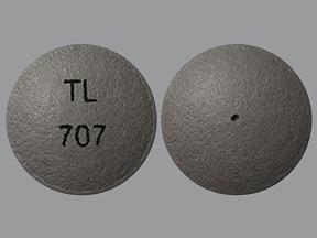 Pill TL 707 Gray Round is Methylphenidate Hydrochloride Extended-Release