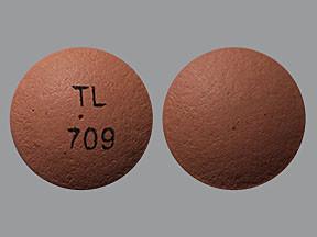 Pill TL 709 Pink Round is Methylphenidate Hydrochloride Extended-Release