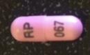 Pill RP 067 Pink Capsule-shape is Fenofibrate (Micronized)