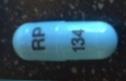 Pill RP 134 Blue Capsule/Oblong is Fenofibrate (Micronized)