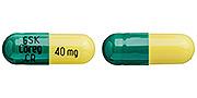 Pill GSK Coreg CR 40 mg Green & Yellow Capsule/Oblong is Carvedilol Phosphate Extended-Release