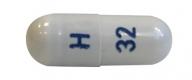 Pill H 32 Gray Capsule/Oblong is Oseltamivir Phosphate