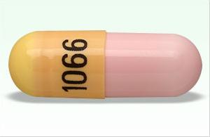 Pill 1066 Pink & Yellow Capsule/Oblong is Clomipramine Hydrochloride