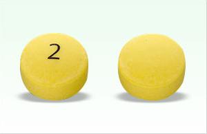 Pill 2 Yellow Round is Glipizide Extended-Release