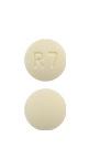 Pill R7 Yellow Round is Ropinirole Hydrochloride