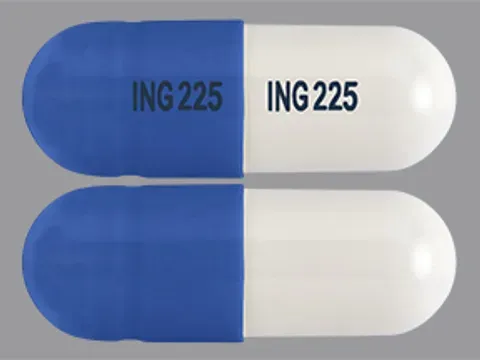 Pill ING 225 ING 225 Blue & White Capsule/Oblong is Tizanidine Hydrochloride