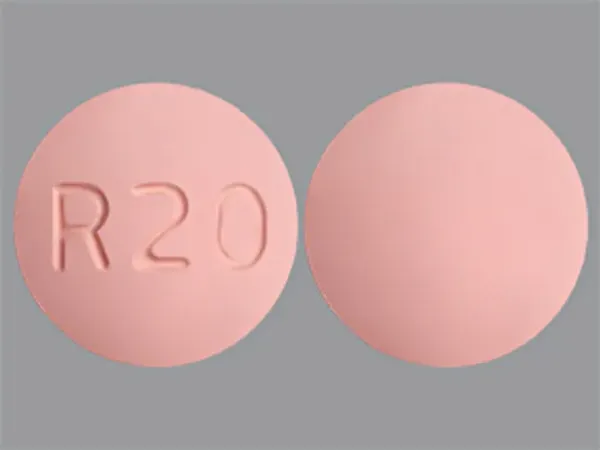 Pill R20 Pink Round is Rosuvastatin Calcium