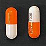 Pill T036 T036 Orange & White Capsule/Oblong is Cyclobenzaprine Hydrochloride Extended-Release