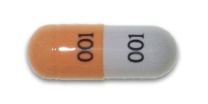 Pill 001 001 Orange & White Capsule/Oblong is Potassium Chloride Extended-Release