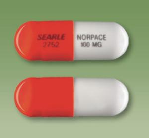 Pill SEARLE 2752 NORPACE 100 MG Orange & White Capsule-shape is Disopyramide Phosphate