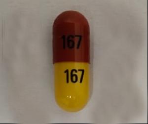 Pill 167 167 Brown & Yellow Capsule/Oblong is Fenofibric Acid Delayed-Release