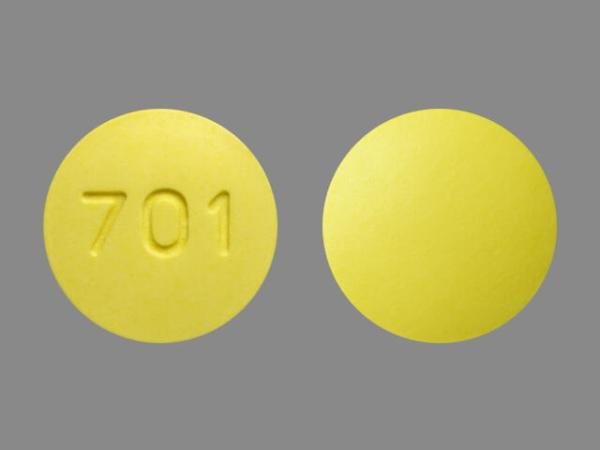 Pill 701 Yellow Round is Bumetanide