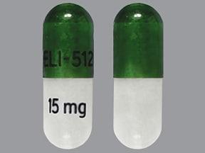 Pill ELI-512 15 mg Green & White Capsule/Oblong is Amphetamine and Dextroamphetamine Extended Release