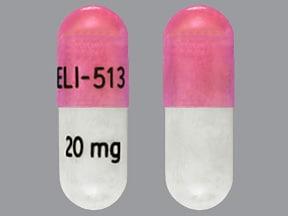 Pill ELI-513 20 mg Pink & White Capsule/Oblong is Amphetamine and Dextroamphetamine Extended Release