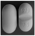 Pill 673 7.5 White Capsule/Oblong is Acetaminophen and Hydrocodone Bitartrate