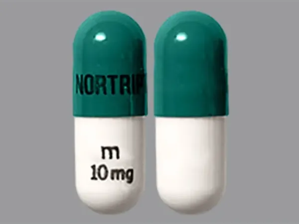 Pill NORTRIPTYLINE m 10 mg Green & White Capsule/Oblong is Nortriptyline Hydrochloride