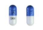 Pill Logo ^ 044 Blue & White Capsule/Oblong is Tizanidine Hydrochloride