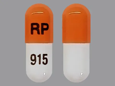 Pill RP 915 Orange & White Capsule/Oblong is Methylphenidate Hydrochloride Extended-Release