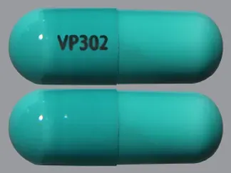 Pill VP302 Green Capsule/Oblong is Chlordiazepoxide Hydrochloride and Clidinium Bromide