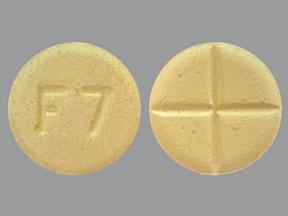 Pill F7 Yellow Round is Amphetamine and Dextroamphetamine