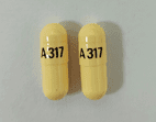 Pill A317 Yellow Capsule/Oblong is Fenofibrate (Micronized)