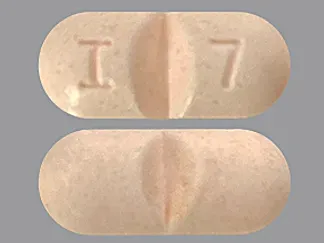 Pill I 7 Peach Capsule/Oblong is Methenamine Hippurate