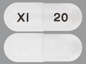 Pill XI 20 White Capsule/Oblong is Omeprazole Delayed-Release