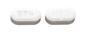 Pill 584 White Capsule/Oblong is Liothyronine Sodium