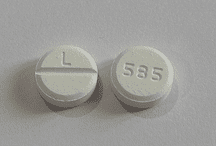 Pill L 585 White Round is Midodrine Hydrochloride