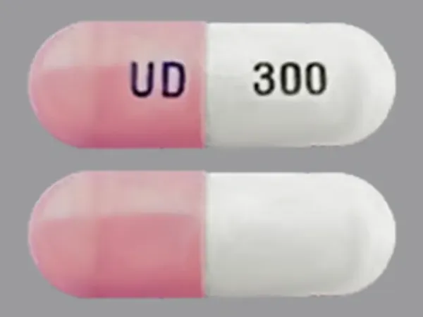 Pill UD 300 Pink & White Capsule/Oblong is Ursodiol