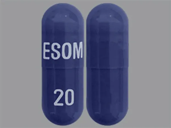 Pill ESOM 20 Blue Capsule/Oblong is Esomeprazole Magnesium Delayed-Release
