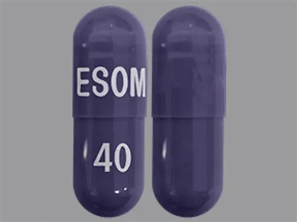 Pill ESOM 40 Blue Capsule/Oblong is Esomeprazole Magnesium Delayed-Release
