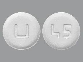 Pill U 45 White Round is Guanfacine Hydrochloride