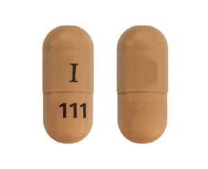 Pill I 111 Brown Capsule/Oblong is Atomoxetine Hydrochloride
