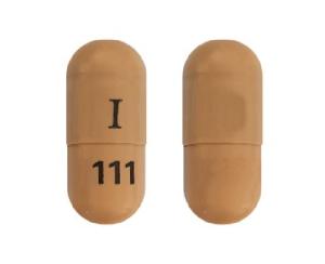 Pill I 111 Brown Capsule/Oblong is Atomoxetine Hydrochloride