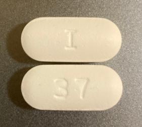 Pill I 37 White Capsule/Oblong is Emtricitabine and Tenofovir Disoproxil Fumarate