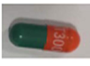 Pill AT300 Green & Orange Capsule/Oblong is Atazanavir Sulfate