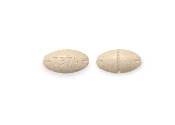 Pill T374 Peach Oval is Amphetamine and Dextroamphetamine