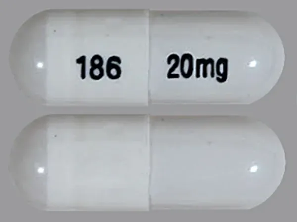 Pill 186 20mg White Capsule/Oblong is Esomeprazole Magnesium Delayed-Release