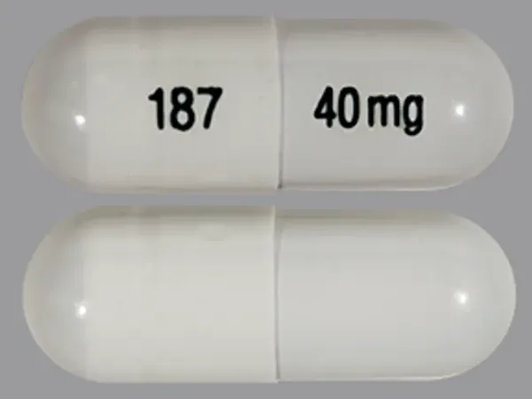 Pill 187 40 mg White Capsule/Oblong is Esomeprazole Magnesium Delayed-Release