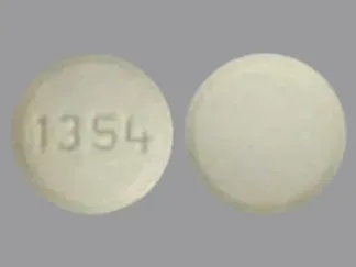 Pill 1354 Beige Round is Nebivolol Hydrochloride