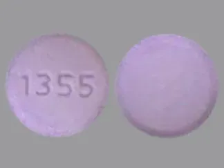 Pill 1355 Purple Round is Nebivolol Hydrochloride
