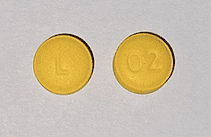 Pill L 02 Yellow Round is Desipramine Hydrochloride