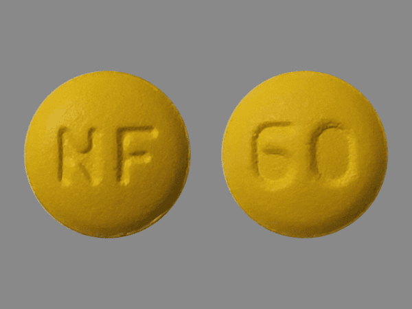 Pill NF 60 Yellow Round is Nifedipine Extended-Release