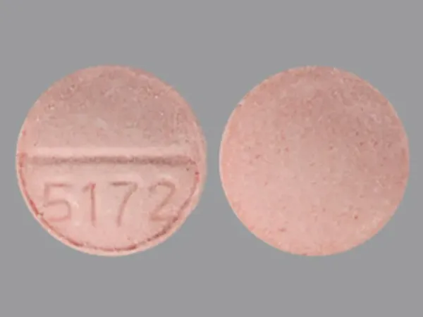 Pill 5172 Pink Round is Meclizine Hydrochloride (Chewable)
