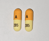 Pill A 285 Orange & White Capsule/Oblong is Clomipramine Hydrochloride