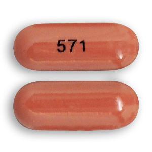 Pill 571 Pink Capsule/Oblong is Isotretinoin