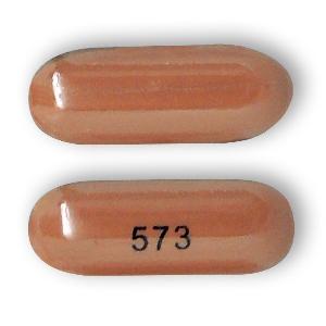 Pill 573 Brown Capsule/Oblong is Isotretinoin