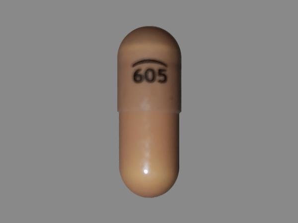 Pill Logo 605 Brown Capsule/Oblong is Loperamide Hydrochloride